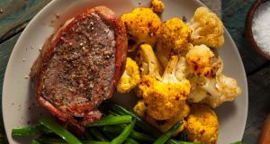 Delicious pork tenderloin in a bacon coat with a great side dish!