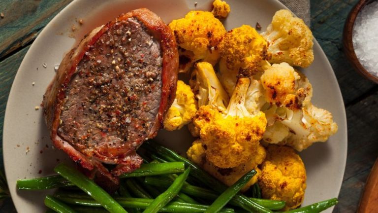 Delicious pork tenderloin in a bacon coat with a great side dish!
