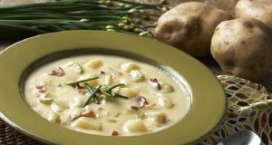 Rich and simple sour potato soup with wild mushrooms and bacon
