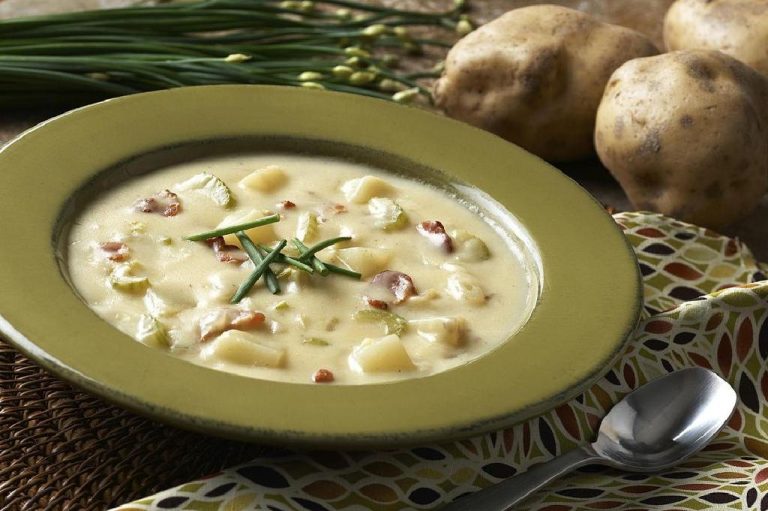 Rich and simple sour potato soup with wild mushrooms and bacon