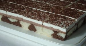 Indulge in heavenly delights: Chocolate cream cake with whipped cream and grated chocolate
