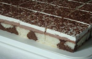 Indulge in heavenly delights: Chocolate cream cake with whipped cream and grated chocolate