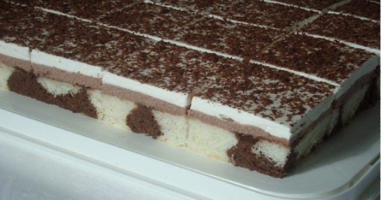 Indulge in heavenly delights: Chocolate cream cake with whipped cream and grated chocolate