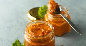 Delicious homemade paprika spread on toast, to use under meat or in other spreads