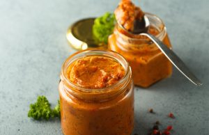 Delicious homemade paprika spread on toast, to use under meat or in other spreads