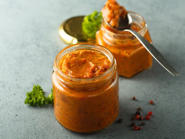 Delicious homemade paprika spread on toast, to use under meat or in other spreads