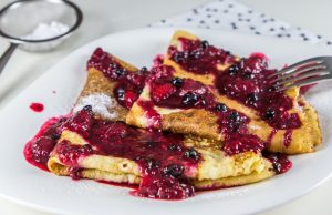 Pancakes with hot raspberry syrup – a delicious combination!