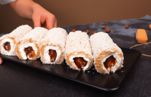 Fantastic coconut rolls filled with sponge cake – Try this goodness!