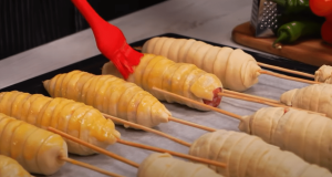 Minced meat wrapped in batter on a skewer – Inspiration for a delicious appetizer or snack!