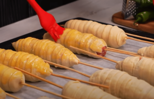Minced meat wrapped in batter on a skewer – Inspiration for a delicious appetizer or snack!