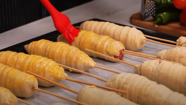 Minced meat wrapped in batter on a skewer – Inspiration for a delicious appetizer or snack!