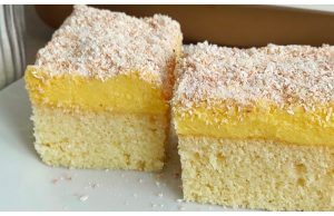Dessert with cream and roasted coconut or “sawdust slices”