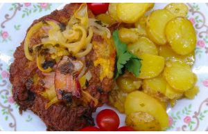 Reverse pork cutlets with bacon and potatoes