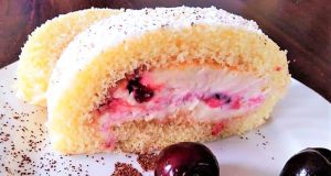 A biscuit roll with cherries and a luxurious cream cheese filling!