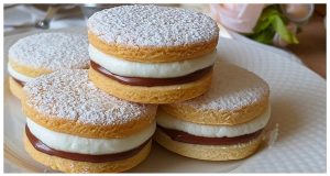 Very tender and delicious heavenly sponge filled with cream and Nutella
