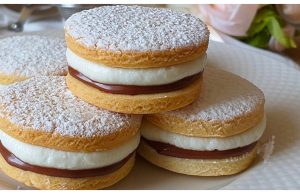 Very tender and delicious heavenly sponge filled with cream and Nutella