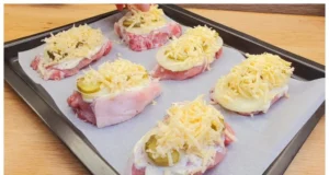 Delicious coated pork slices baked in the oven: Delight your family with a new tasty recipe
