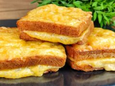 Baked Toasts from the Oven in an Egg Coat with Ham and Cheese Bread toasts filled with ham and cheese