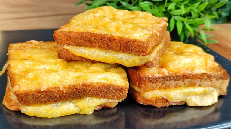 Baked Toasts from the Oven in an Egg Coat with Ham and Cheese