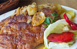 Juicy Upside-Down Pork Schnitzels Baked with Bacon and Onions Juicy upside-down pork schnitzels baked with bacon and onions