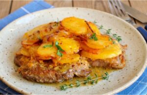 Juicy Pork Neck Baked with Creamy Potatoes and Caramelized Onions Pork neck casserole with creamy potatoes and curry onions