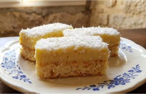 Extra Moist Coconut Cake: Recipe for a Delicate Dessert with Egg Yolk Cream, Milk Soak, and Coconut Luxurious coconut cake with vanilla cream – incredibly moist dessert