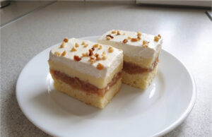 Apple Cake with Vanilla Cream: Moist Dessert for Coffee or Tea Layered apple cake with vanilla cream and whipped cream