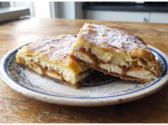 Apple and Custard Puff Pastry Slices: Moist Dessert with Simple Layering Apple and custard puff pastry slices on a tray