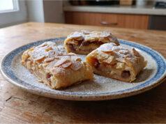 Apple Strudel with Poppy Seeds: Delicate Quark Dough and Juicy Filling Apple strudel with poppy seeds and quark dough on a plate