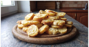 Baked Old Bread Rolls with Cheese: Crispy Snack Ready in Minutes Baked bread roll slices with cheese and toppings