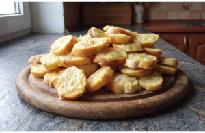 Baked Old Bread Rolls with Cheese: Crispy Snack Ready in Minutes Baked bread roll slices with cheese and toppings