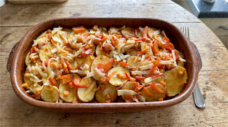 Baked Potatoes with Pork, Kunovjanka and Cream: Hearty Dinner in One Baking Dish