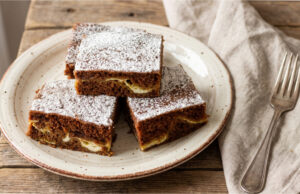 Black Cake with Quark and Lotus Biscuits: Moist Dessert Without Lengthy Beating Black cake with quark and Lotus biscuits on a tray