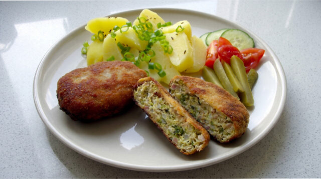 cabbage-patties-golden-coating Cabbage patties with golden coating served with mashed potatoes