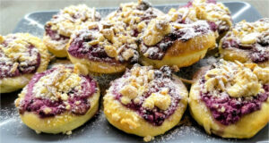 Delicate Yeast Pastries for Afternoon Coffee: With Blackberry Quark, Rum Raisins, Crumble and Almonds Delicate yeast pastries with blackberry quark and rum raisins