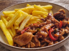 Chicken Stir-Fry with Vegetables and Fries: Juicy Dinner with Asian Sauces Delicious chicken stir-fry with vegetables and homemade fries