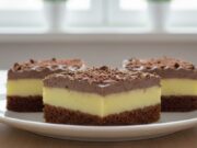 Slices with Egg Liqueur, Authentic Parisian Whipped Cream, and Cocoa Sponge Luxurious slices with egg liqueur and Parisian whipped cream like from a patisserie