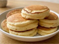Recipe for Extra Fluffy Japanese Pancakes: Tall, Soft and Light as a Cloud Extra fluffy Japanese pancakes stacked on a plate with syrup and fruit