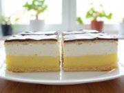 Homemade Krémeš from Flaky Puff Pastry with Rich Vanilla Cream, Whipped Cream and Chocolate Glaze Homemade krémeš from puff pastry with vanilla cream and chocolate