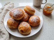 Fluffy Homemade Doughnuts with Jam: Soft Dough and Golden Surface Without Excess Oil Fluffy homemade doughnuts with jam on a plate