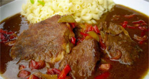 Classic Czech Dish: Spicy Gypsy Pork Roast from Chops in a Rich Pepper and Vegetable Sauce Gypsy pork roast recipe for juicy pork in a spicy and aromatic sauce