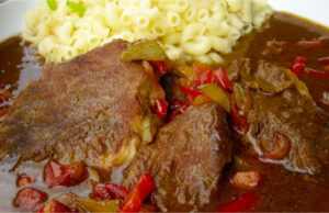 Classic Czech Dish: Spicy Gypsy Pork Roast from Chops in a Rich Pepper and Vegetable Sauce Gypsy pork roast recipe for juicy pork in a spicy and aromatic sauce