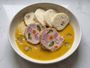 Hamburg Pork with Bread Dumplings: Traditional Sunday Lunch with Creamy Vegetable Sauce Hamburg pork with bread dumplings and creamy vegetable sauce served on a plate