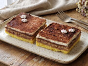 Legionnaire Slices with Jam: Traditional Nut Dessert on One Large Baking Tray Legionnaire slices with jam and nut meringue on a tray