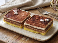 Legionnaire Slices with Jam: Traditional Nut Dessert on One Large Baking Tray Legionnaire slices with jam and nut meringue on a tray