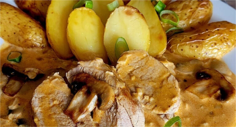 Luxurious Delicacy: Tender Pork Tenderloin in Creamy Mushroom Sauce with Roasted Potatoes