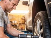 At the Tire Shop, They Stripped the Thread on My Wheel Bolt and Blamed My Old Car Mechanic using a pneumatic wrench on a car wheel.