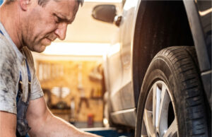 At the Tire Shop, They Stripped the Thread on My Wheel Bolt and Blamed My Old Car Mechanic using a pneumatic wrench on a car wheel.