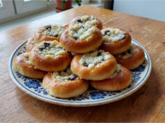 Homemade Oil Pastries with Quark and Plum Jam: Sweet Treats Without Waiting for Rising Homemade oil pastries with quark and plum jam on a tray