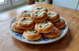 Homemade Oil Pastries with Quark and Plum Jam: Sweet Treats Without Waiting for Rising Homemade oil pastries with quark and plum jam on a tray